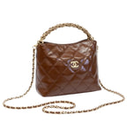 Chanel | Quilted Braided Handle Chain Hobo In Brown Leather.