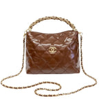 Chanel | Quilted Braided Handle Chain Hobo In Brown Leather.
