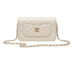 Chanel | Classic Flap Bag In Quilted White Lambskin Leather.