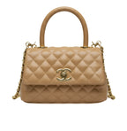 Chanel | Mini Coco Handle Flap Bag In Caramel/beige Caviar Leather.