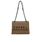 Chanel | Timeless/classic Flap Bag In Beige Jersey Material.