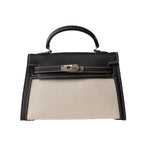 Hermès | Mini Kelly 2 Bag In Black And White Canvas With Palladium Hardware